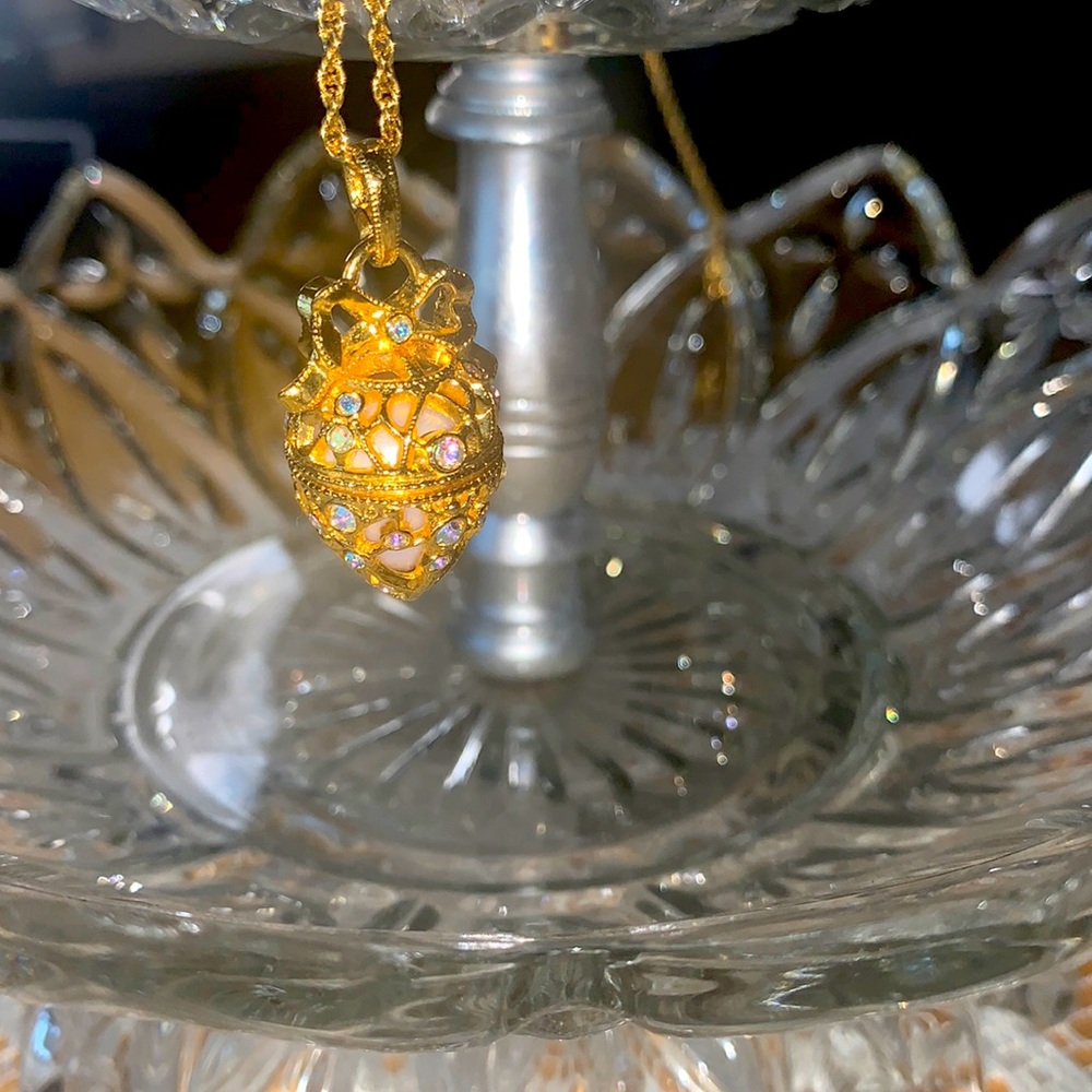 Joan Rivers gold vintage necklace with gold egg pendant.